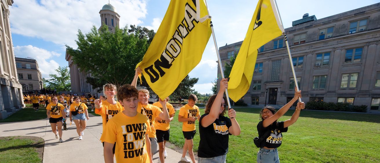Leaders guide students from convocation to the President's Block Party
