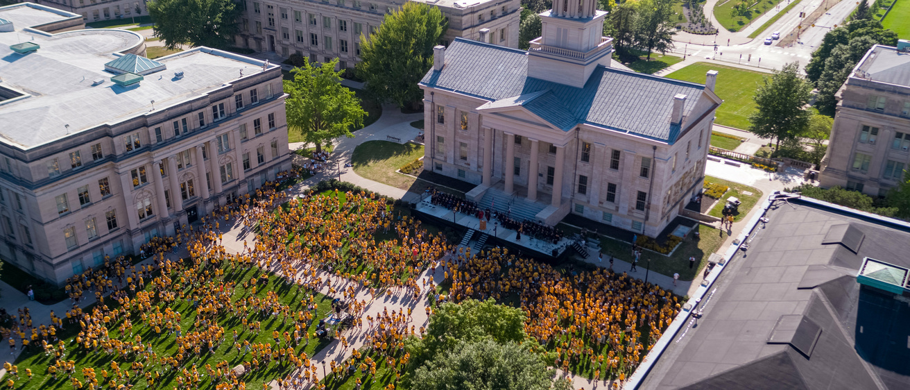 students gather on the Pentacrest